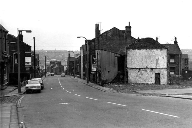 Looking north-east along Elland Road in 1979 showing the junctions with Little Lane on the right and Old Road on the left. Derelict outbuildings can be seen on the right next to no 17a Elland Road.