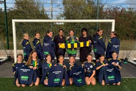 Specsavers Pocklington Directors, Amy and Sejal, celebrating the sponsorship with Market Weighton Town FC