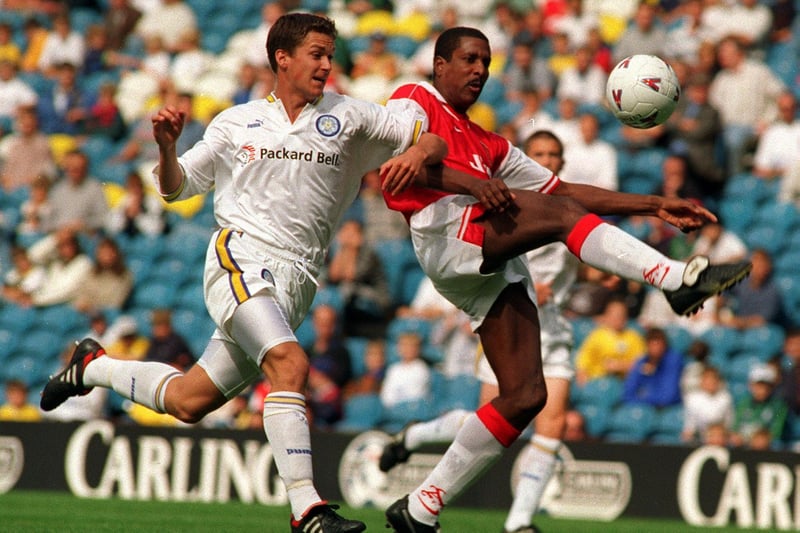 Leeds United's Andy Couzens battles with legend Viv Anderson playing for Arsenal during John Lukic's testimonial match at Elland Road.