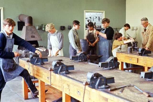 Pupils of form 3E at work in the metalwork room in July 1965. They are under direction of teacher, Mr. J. Banks.