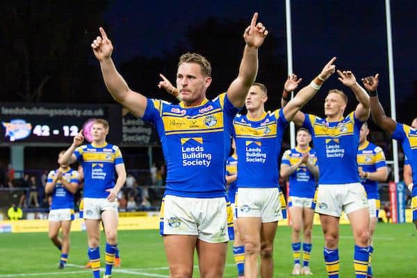 Rhinos, led by Brad Dwyer, celebrate the win over Wigan, their fifth in nine games under Rohan Smith. Picture by Allan McKenzie/SWpix.com.