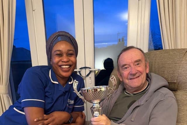 Shifau with Nicholas Hardaker, one of the customers who nominated her.