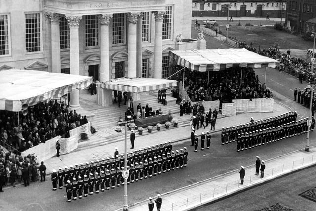 Granting of the Freedom of the City of Leeds to H.M.S. Ark Royal, Queen Elizabeth The Queen Mother according the honour in October 1973. This view is of Leeds Civic Hall. The Royal party is in the centre, with two temporary stands for guests. The Queen Mother spoke of her association with Ark Royal, recalling that she had launched the ship in Birkenhead 23 years previously. 400 members of the ships company were present, from the total of 2,500 crew. They were accompanied by the combined bands of the Commander-in-Chief Fleet and Ark Royal. A march past took them from the Civic Hall through the city centre. There was also a flypast by 26 aircraft from the ship.