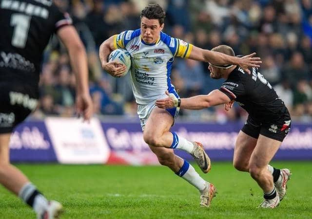 Brodie Croft on the attack for Leeds Rhinos against London Broncos before a groin injury ended his evening. Picture by Bruce Rollinson.