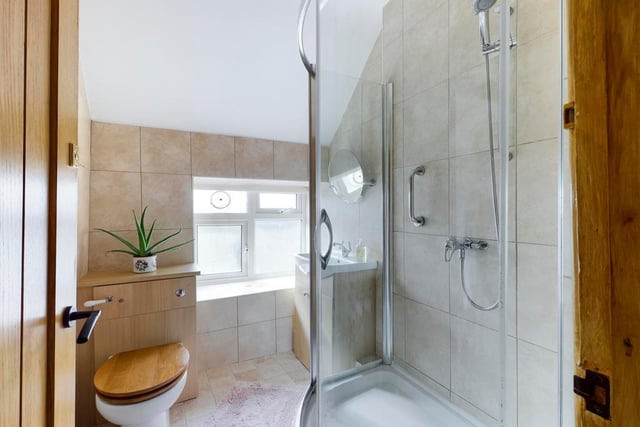 A modern shower room is on the first floor.