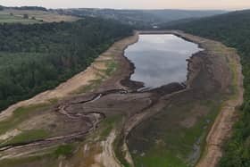 File photo dated 12/08/2025 of a general view of low water levels at Broomhead Reservoir, South Yorkshire. Dramatically low reservoir levels are revealing lost structures from landscapes drowned decades ago, including the remains of a bridge inundated when the reservoir was built in the 1920s. A stone arch, thought to be part of Broomhead Bridge, also known as Cooper Carr Bridge, which spanned Ewden Beck close to a corn mill, has been revealed at the reservoir, after it was lost when the lake was constructed. Issue date: Tuesday September 2, 2025. PA Photo. Photo credit should read: Richard McCarthy/PA Wire