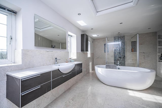 A luxury, contemporary bathroom within the property.