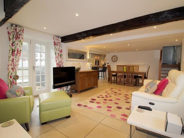 Open plan living and dining areas.