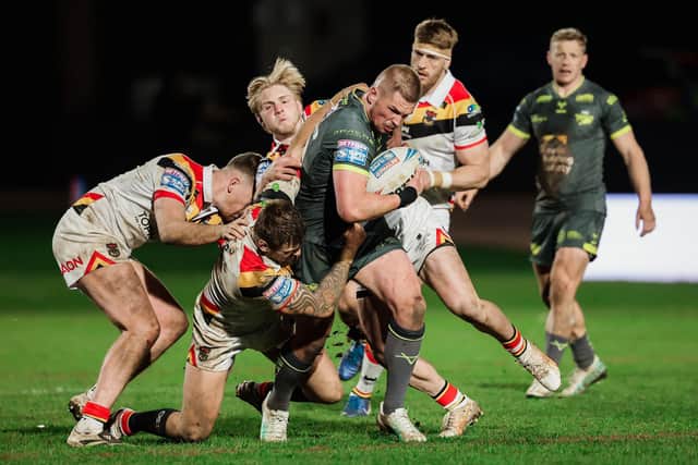 Tom Holroyd, seen in action away to Bradford Bulls at Easter, will makes his Leeds Rhinos return against Hull KR on Friday. Picture by Alex Whitehead/SWpix.com.