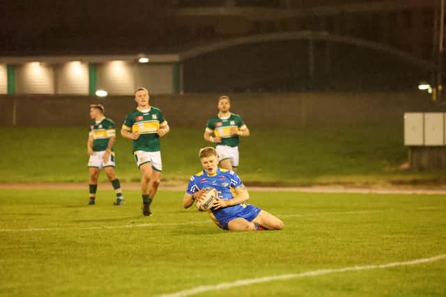 Dylan Proud scores for Leeds Rhinos in the 18-16 Harry Jepson Memorial Trophy defeat at Hunslet. Picture by John Victor.
