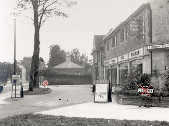 Corner House from Harrogate Road in September 1936. A sign for Craven A cigarettes has been crossed, also one towards the left. There is a board advertising afternoon tea in the cafe, which has part of the corner House facilities