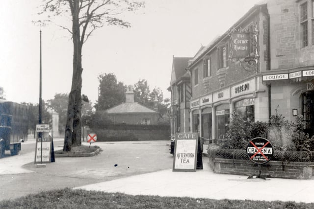 Corner House from Harrogate Road in September 1936. A sign for Craven A cigarettes has been crossed, also one towards the left. There is a board advertising afternoon tea in the cafe, which has part of the corner House facilities