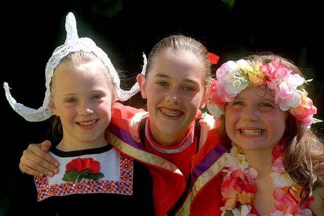 Faye Sheldrake, Ashleigh Ollivant and Stephanie Dalton who were on Helen Lamb School of Dance float for the Rothwell Carnival parade in July 1999.