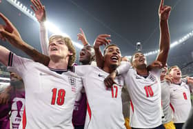 Jubilant England players celebrate their victory over Mexico which saw them go through to quarter-finals of the World Cup and a tie against Norway tonight.