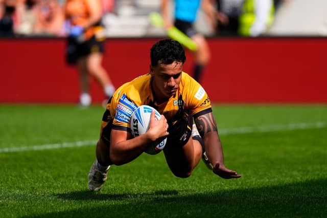 Daejarn Asi scores for Castleford Tigers during last week's defeat at Salford Red Devils. Picture by Olly Hassell/SWpix.com.