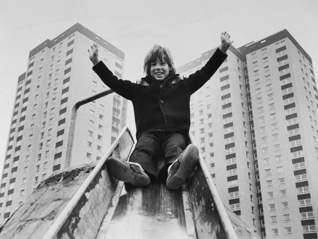 The flats at Cottingley boasted a new adventure playground in October 1972. Pictured is Philip Darby at the top of a slide.