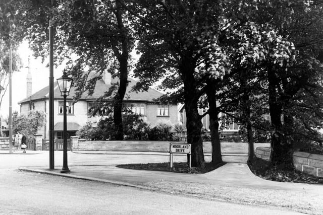 Moorland Drive at corner with Harrogate Road in June 1952. Two women stand in front of a house.