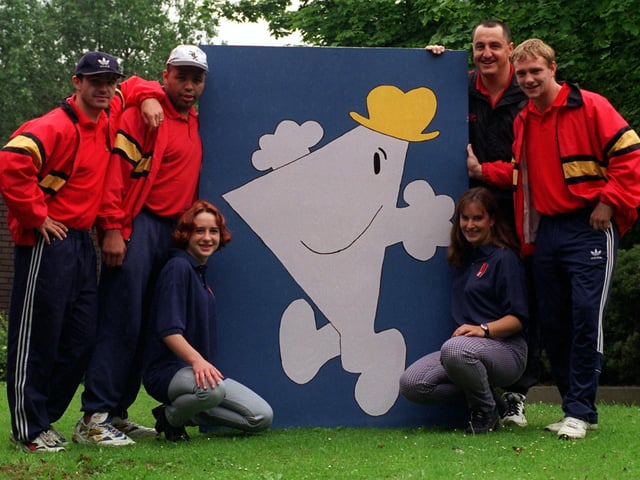 A group of Volunteers from the Prince's Trust renovated classrooms and gardens at Richard Oastler School in Burley. Pictured are members of the Dewsbury Rams, back row, from left, Barry Eatonk, Shayne Williams, Brett Patterson and Shaun Austerfield who visited the school its presentation day in June 1997. Looking on, are two of the volunteers, front row from left, are Hazel Cross and Lisa Robinson.