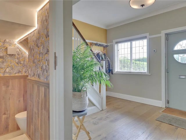 The entrance hall offers a stunning first impression - spacious with traditional character features and Swedish engineered oak floor runs throughout the ground floor. A staircase leads up to the first floor and doors to the guest w/c, living room and family living/dining kitchen.
