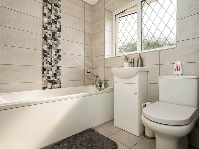 There is also a family bathroom containing a jacuzzi bath.