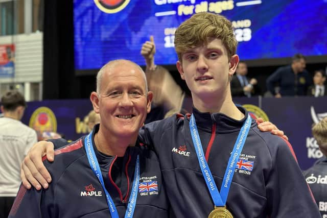 Glenn Riley (left), 52, pictured with Barney Ross (right), 15, at the 11th WUKF world championships held this year in Dundee, Scotland. Glenn took home a bronze medal, while Barney took home a gold medal.