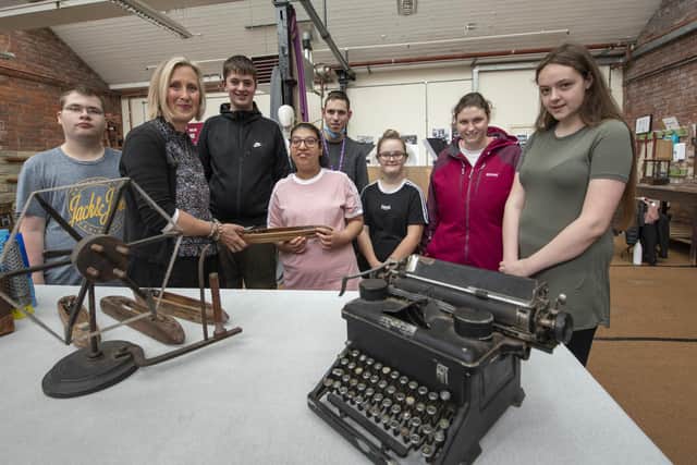 Heritage officer Alison McMaster at the Sunny Bank Mills Archive with students and staff at West SILC.