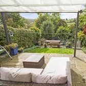 The stunning garden and backdrop to the terraced property.
