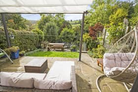 The stunning garden and backdrop to the terraced property.