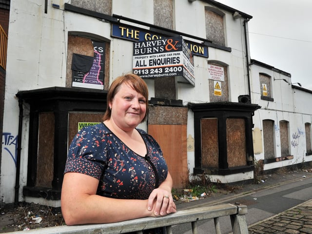 September 2011 and pictured is Lynne Wilson outside the boarded up Golden Lion. It had once been run by her grandparents Charles & Lillian Haigh.