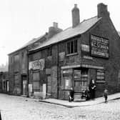 The junction of Mabgate, left, with St. Mary's Street, right, in September 1919. Children gather on the corner in front of a shop which is boarded up (B. Bianchi's) as are other properties on Mabgate. These very old cruck framed timber houses, which could even be from the medieval period, were due to be demolished. Rows of brick built two-storey back-to-back terraced houses lead up the hill on St Mary's Street.