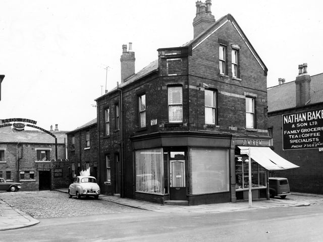 Beeston Road showing junctions of Marquis Street on the left and Sutcliffe Street, far right. At the end of Marquis Street are the premises of Leeds Paint Manufacturing Company Ltd, Gem Works. The premises fronting onto Beeston Road are, left, number 58, Mavis, Ladies Hairdressers and right number 56, J. W. Kew, butcher. Far right past the junction of Sutcliffe Street is Nathan Bake & Son Ltd. Family Grocers & Tea & Coffee Specialists.