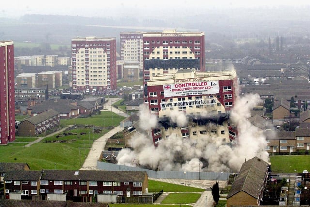 Controlled demolition of two blocks of flats in the Swarcliffe area of Leeds on March 24, 2001.