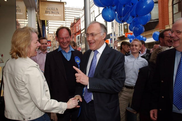 Conservative leader Michael Howard tries to drum up some support during a walk around in Leeds city centre on May 21, 2004.