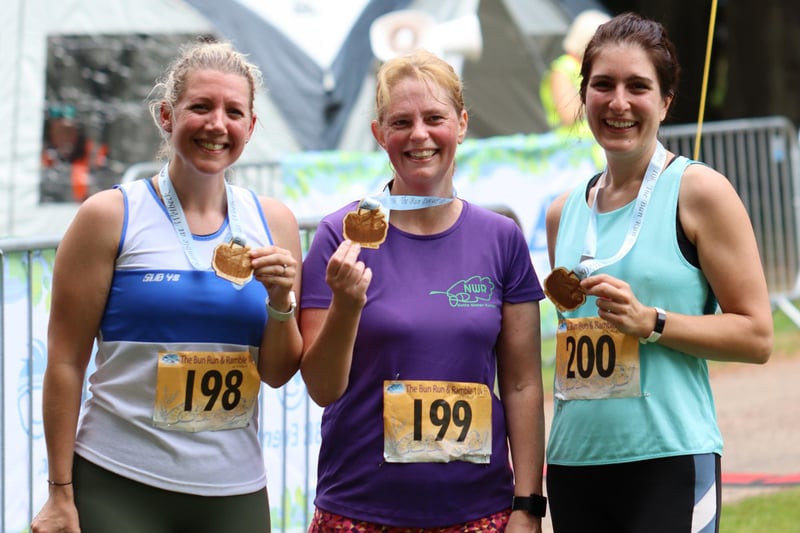 Delighted runners show off their medals at the end of the Bun Run. Pictures by Mick Hall Photos.