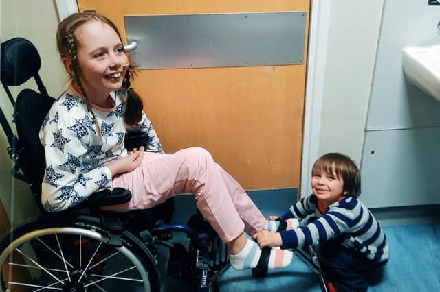 Esmee in recovery at Great Ormond Street with brother Ephron. Picture Jonathan Gawthorpe