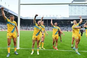 Rhinos players celebrate their win over Castleford at last year's Magic Weekend in Newcastle. Picture by Will Palmer/SWpix.com.
