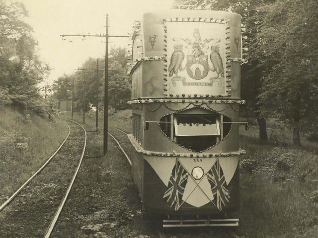 Decorated tram no. 359 travelling through Middleton Woods, with the Leeds Coat of Arms seen at the top. This tram was first decorated for the Festival of Britain in 1951 and was subsequently decorated for various events until 1955.