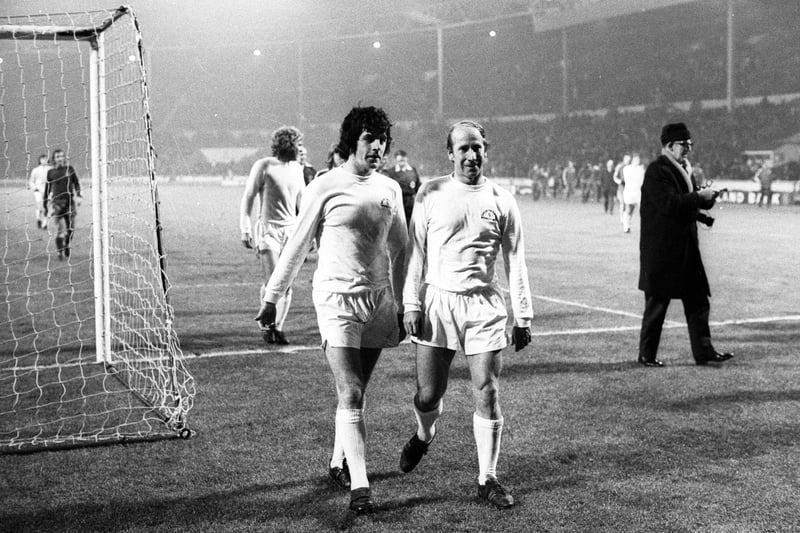 Peter Lorimer and Bobby Charlton (right) in 1973.