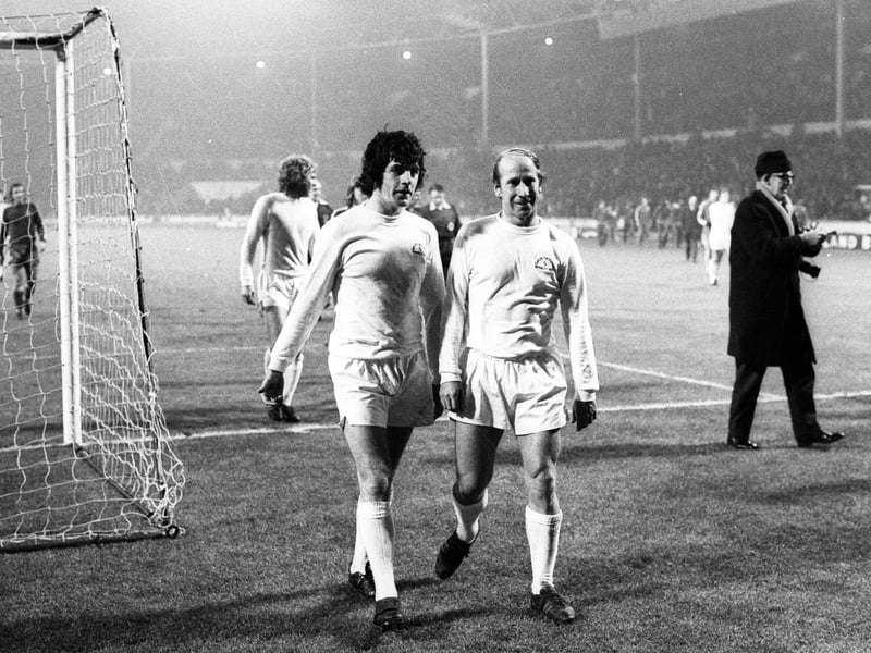 Peter Lorimer and Bobby Charlton (right) in 1973.
