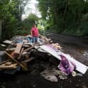 Pictured is Leslie Riley, aged 71, on Ridge Road, Meanwood in Leeds where there is fly tipping and potholes that have caused him grief. Photo: Simon Hulme