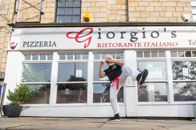Septuagenarian George Psarias was inspired to take up karate by his energetic grandkids, who practice at the Leeds North Martial Arts Academy. Photo: James Hardisty.
