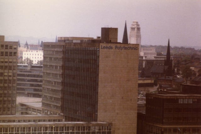 An aerial view of buildings of Leeds Polytechnic on Portland Way. Formed in 1970, Leeds Polytechnic was granted university status in 1992 and became Leeds Metropolitan University. In September 2014 it was renamed Leeds Beckett University. The white tower of the Parkinson Building of Leeds University (the first university in the city) is seen in the background along with the spires of Emmanuel and Trinity Churches.