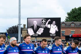 Wakefield Trinity players lined up for a minute's silence in memory of John Kear and former player Geoff Oakes before the game against Hull KR earlier this month. Picture by Allan McKenzie/SWpix.com.