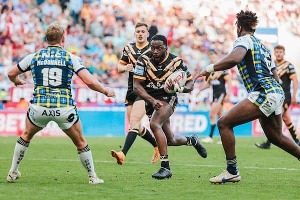 Muizz Mustapha on the charge for Tigers against his former club Leeds at this year's Magic Weekend. Picture by Alex Whitehead/SWpix.com.