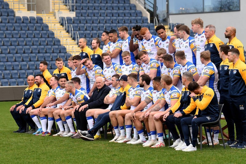 Leeds Rhinos' players and rugby staff prepare for their 2024 team picture.