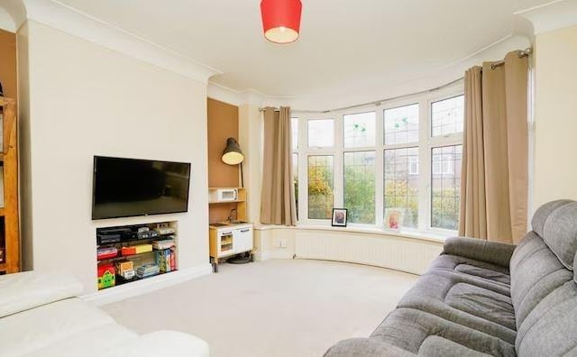 The property features two well-proportioned reception rooms both with bay windows.
