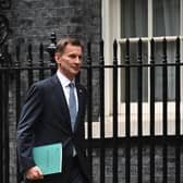 Britain's Chancellor of the Exchequer Jeremy Hunt leaves Downing Street in central London on his way to make a full budget statement in the House of Commons on November 17, 2022.