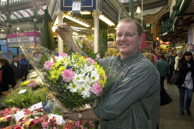 Florist, David Hudson, at Brian's Florists, in Kirkgate Market, Leeds city centre.
