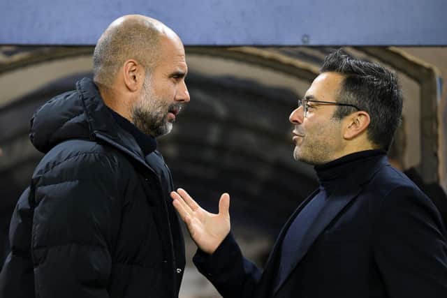 PROGRESS: Under Andrea Radrizzani, right, as a whole at Leeds United, despite the club's relegation, the Italian pictured speaking to Manchester City boss Pep Guardiola before the Premier League clash against Manchester City last December. Photo by OLI SCARFF/AFP via Getty Images.