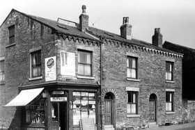 The junction of Mushroom Street (left) and Cambridge Street (right). The shop on the corner is number 30 Mushroom Street, a grocery selling Lyons tea, Typhoo tea, Capstan cigarettes, Lyons cakes, Cherry Blossom polish and Tizer. On the right are numbers 1 and 3 Cambridge Street, two back-to-back terraced houses with a shared outside toilet yard on the far right. Pictured in September 1959.